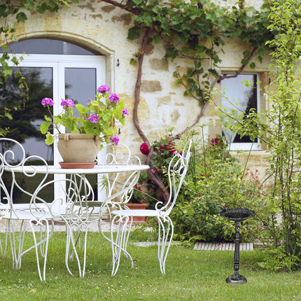 Standing bird bath in cast iron