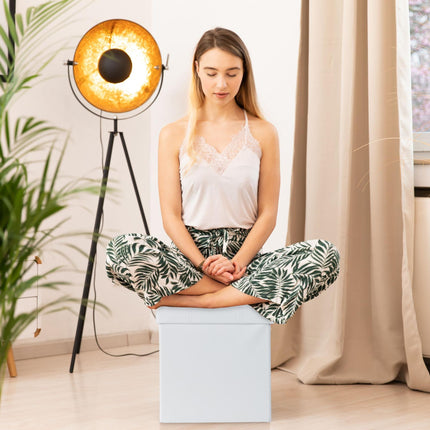 Stool in artificial leather with storage space