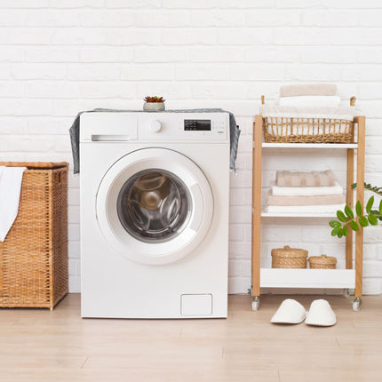 Washing machine pad with pockets