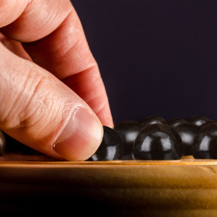 Wooden solitaire game